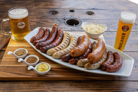 German Sausages served with various German mustards by sauerkraut and beers