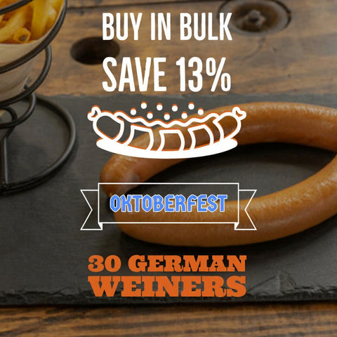 Germandeli.com bulk pack of 30 authentic German wieners with natural casing, served on a slate board for Oktoberfest.